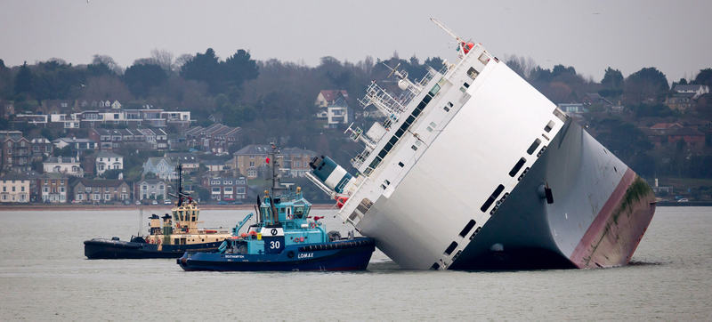 Illustration for article titled Drone Footage Shows Grounded Car Transporter In Rough Shape